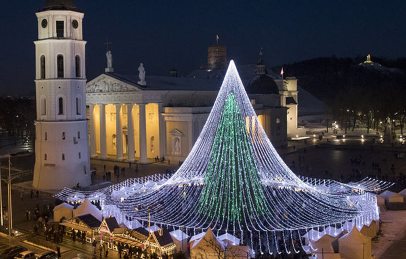 The national Christmas tree stands in Cathedral Square in Vilnius, Lithuania, Sunday, Dec. 4, 2016. (AP Photo/Mindaugas Kulbis)