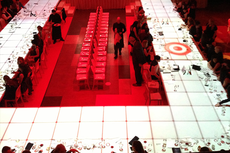 4th Annual Target Toronto Fashion Incubator Fashion Show Projection mapping onto runway/dining room table by Westbury Photo credit: Rob Sandolowich from Westbury National